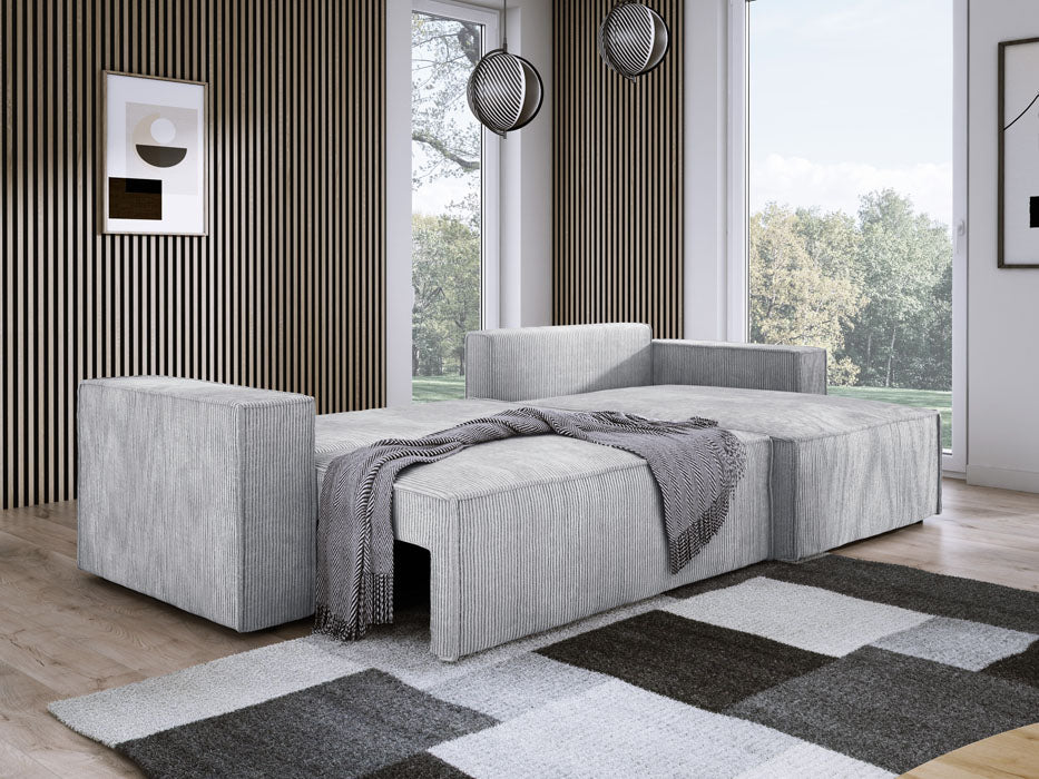 Designer Sofa Velanova mit Schlaffunktion und Stauraum aus Cord