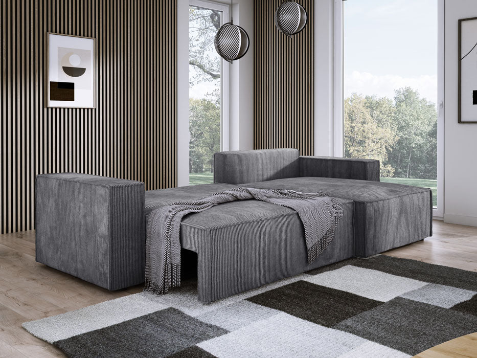 Designer Sofa Velanova mit Schlaffunktion und Stauraum aus Cord