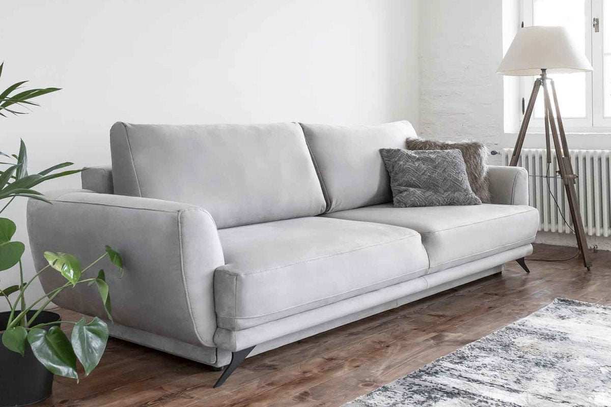 Designer Sofa Megan mit Schlaffunktion und Stauraum - Luxusbetten24