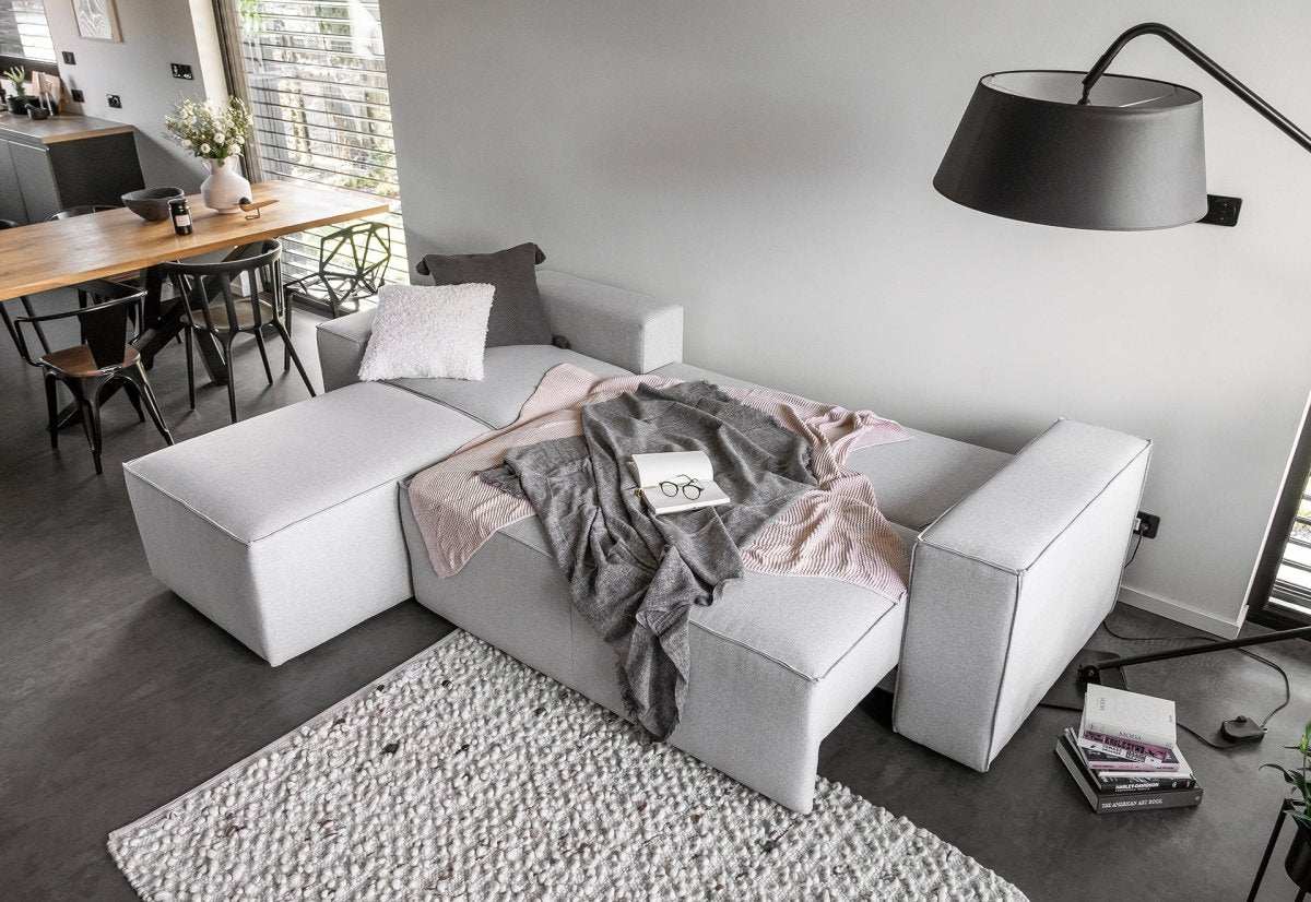 Designer Sofa Solaris mit Schlaffunktion und Stauraum - Luxusbetten24